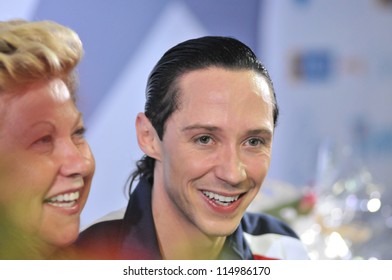 ESPOO, FINLAND - OCTOBER 06: Johnny Weir Of USA And Coach Galina Zmievskaya After His Free Skate In Kiss&Cry Zone At Finlandia Trophy 2012 On October 06, 2012 In Espoo, Finland