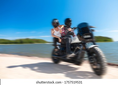 Espoo, Uusimaa, Finland. June 13, 2020
Man And Woman On A Motorcycle Harley Davidson, Sunny Summer Day At Sea