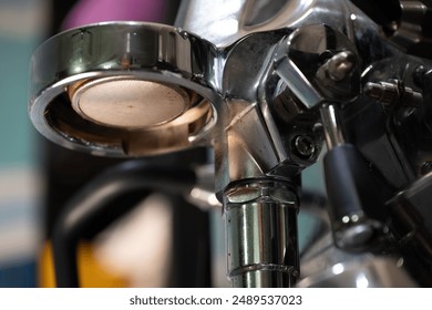 Espresso Alchemy: Brewing Perfection in Chrome and Brass. A gleaming chrome and brass espresso machine stands ready to transform coffee beans into liquid gold. - Powered by Shutterstock