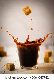 Espresso Coffee With Falling Brown Sugar Cube