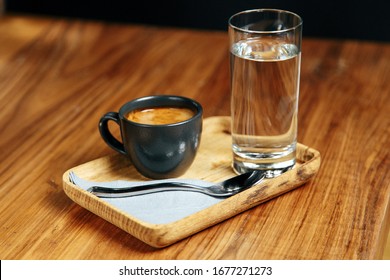 Espresso Coffee With Glass Of Water