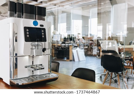Espresso coffee machine in the loft office