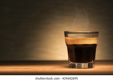 Espresso Coffee On A Wooden Table