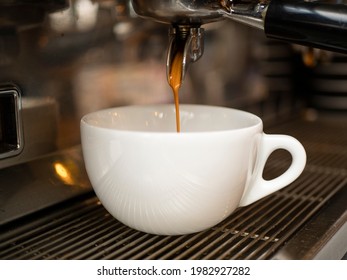 espresso coffee, espresso preparation pours coffee