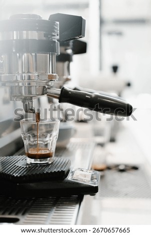 Espresso machine brewing coffee at a café