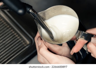 Espresso machine pours fresh black coffee closeup. Coffee machine preparing fresh coffee and pouring into yellow cups at restaurant, bar or pub. - Powered by Shutterstock