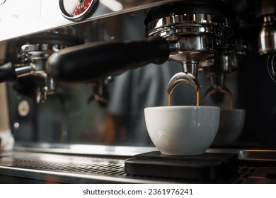espresso preparation according to a classic recipe in an Italian coffee machine