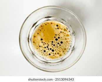 Espresso in transparent cup, top view, cream foam of espresso coffee - Powered by Shutterstock