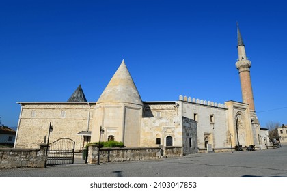 Esrefoglu Mosque and Complex, located in Beysehir, Konya, Turkey, was built in 1299. It consists of a mosque, covered bazaar, tomb, bath and madrasah.