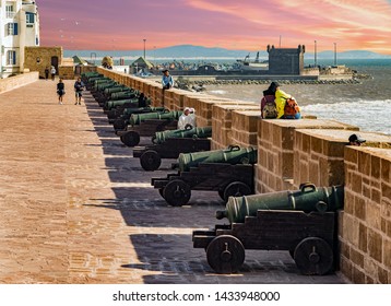 Essaouira, Morocco - July 5, 2019.: Tourists And Locals Exploring Essaouira Citadel Fortress On Sunset Hours.Essaouira Is The UNESCO World Heritage Site In Morocco. North Africa