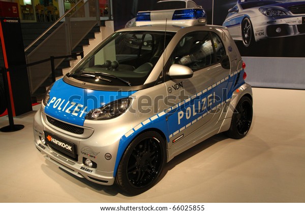 ESSEN - NOV 26: Smart tuned as part of\
the tune-it-save-campaign modified as police car shown on Essen\
Motor Show 2010 on November 26, 2010 in Essen,\
Germany.