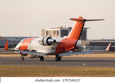 Essendon, Australia - January 2, 2020: Australian Maritime Safety Authority Bombardier Challenger 604 Aircraft Used For Maritime Patrol, Surveillance And Search Missions Landing At Essendon Airport.