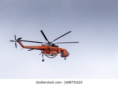 Essendon, Victoria - December 11, 2019: Erickson Air Crane Helicopter Returning To Essendon Airport After A Mission