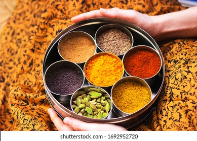 Essential Indian spices in an Indian spice box