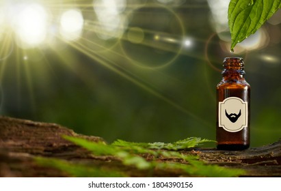 Essential oil for beard or aromatherapy in glass bottl. Copy space on bottle.