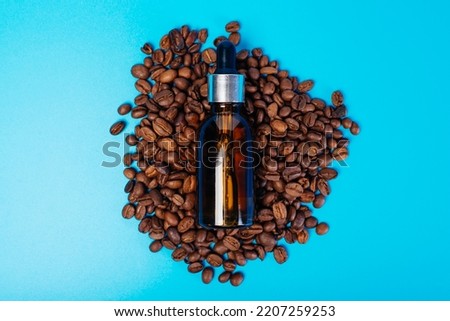 Essential oil with coffee beans. Essentialoil for men
