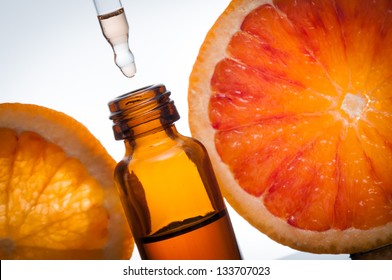 Essential Oil With Oranges