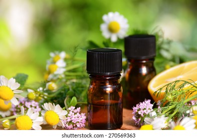 essential oils with lemon and herbs