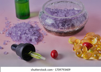 Essential Oils And Skin Care Products,shot On A Pastel Gradient Background,shot Close Up And From Above.