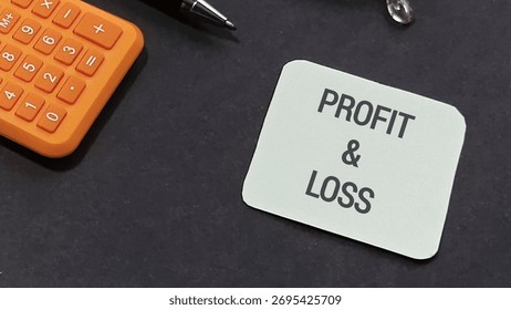 Essential tools for financial analysis. Visualize profit and loss with calculator and pen on a sleek black desk, ideal for business and accounting success.