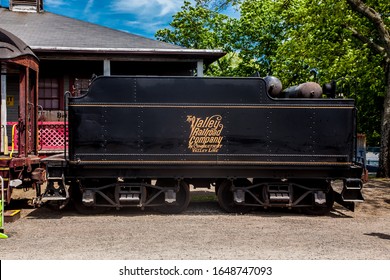 ESSEX, CT, USA - MAY 24, 2015: Connecticut Valley Railroad Steam Train Locomotive in train station.