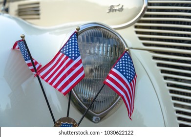 Essex, CT / USA - September 13, 2011: American Flags And Vintage Ford