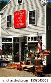 Essex, MA, USA August 20 An Antique Store In Essex, Massachusetts Displays Its Wares Outside The Shop