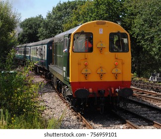 Essex, UK - 08/13/17: British Railways Class 20 Diesel-electric Locomotive D8001 Leaving North Weald Station, Epping Ongar Railway.