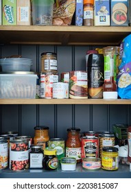 Essex, United Kingdom, September 3, 2022. Illustrative Editorial, Studio Set Up. Basic Staple Food Provisions (jars, Packets, Tins, Boxes) In A Storage Cupboard, Larder Or Pantry. Food Bank Shortage.