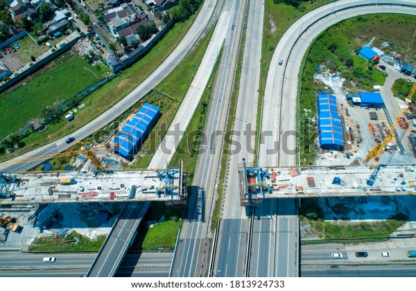 Established Aerial View of Balance\
Cantilever Long Span Bridge Construction for the Jakarta-Bandung\
High Speed Train Project, Soroja Interchange, Pasir Koja,\
Bandung