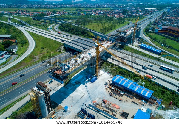 Established Aerial View of Balance\
Cantilever Long Span Bridge Construction for the Jakarta-Bandung\
High Speed Train Project, Soroja Interchange, Pasir Koja,\
Bandung