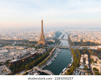 Establishing Aerial view of Paris Cityscape with Eiffel Tower and Seine river on sunrise, France. Landmark Monument as Famous Touristic Destination. Romantic Travel and Urban Skyline Panorama - Powered by Shutterstock