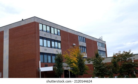 Establishing Shot Of Modern College Campus Dormitory Building On Overcast Day