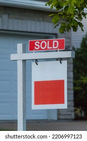 Estate Agency SOLD Sign. Real Estate Market Property Sold Sign In Front Of New House. Copy Space For Text.