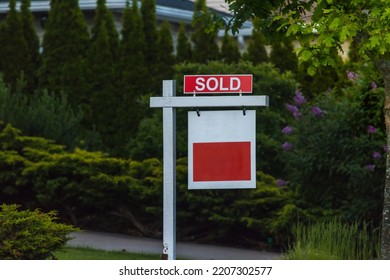 Estate Agency SOLD Sign. Real Estate Market Property Sold Sign In Front Of New House. Copy Space For Text.