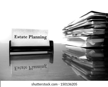 Estate Planning business card on desk with files
