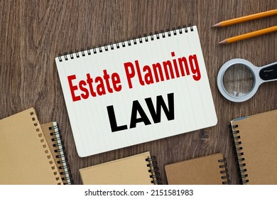 Estate Planning Law. Open Notepad With Text Near Many Notepads And Magnifier