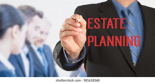 Estate Planning, Male Hand In Business Wear Holding A Thick Pen Writing, With Office Team Blurred In Background, Digital Composing.