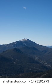 Estes Cone In Rocky Mountian National Park Mountain With Snowy Peak And Green Forest With Blue Sky