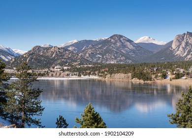 Estes Park, CO - November 29, 2020: View Of The The Rocky Mountains And The Town Of Estes Park, Colorado From Across Lake Estes