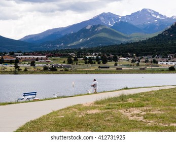 Estes Park, Colorado - July 15, 2015: Man Fishing At Lake Estes Waterfront