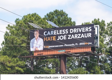 Esther, USA - April 24, 2018: Road Sign Billboard Advertisement For Auto Accident Injury Lawyer, Attorney In Pensacola Providing Legal Service