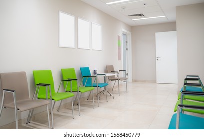 Esthetic And Clean Modern Private Clinic Or Vet Waiting Room With Empty Posters