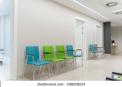 Esthetic And Clean Modern Private Clinic Or Vet Waiting Room With Empty Posters