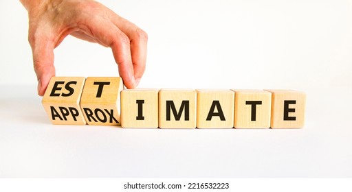 Estimate Or Approximate Symbol. Businessman Turns Wooden Cubes And Changes The Word 'approximate' To 'estimate'. Beautiful White Background, Copy Space. Business, Estimate Or Approximate Concept.