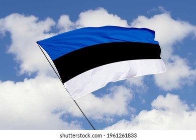 Estonia flag isolated on sky background with clipping path. close up waving flag of Estonia. flag symbols of Estonia.