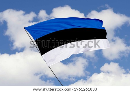 Estonia flag isolated on sky background with clipping path. close up waving flag of Estonia. flag symbols of Estonia.