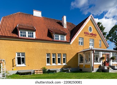 ESTONIA, VILJANDI, SEPTEMBER, 2022: Villa Maria Restaurant In A Yellow Renovation House With Glass Veranda In Viljandi Southern Estonia.