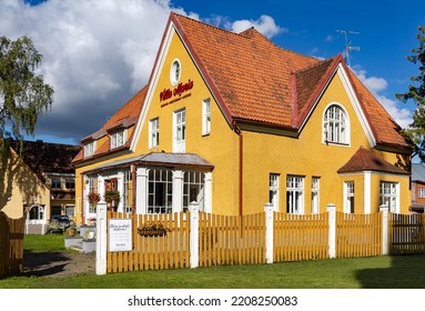 ESTONIA, VILJANDI, SEPTEMBER, 2022: Villa Maria Restaurant In A Yellow Renovation House With Glass Veranda In Viljandi Southern Estonia.