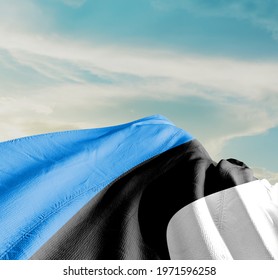Estonia waving flag in the sky.